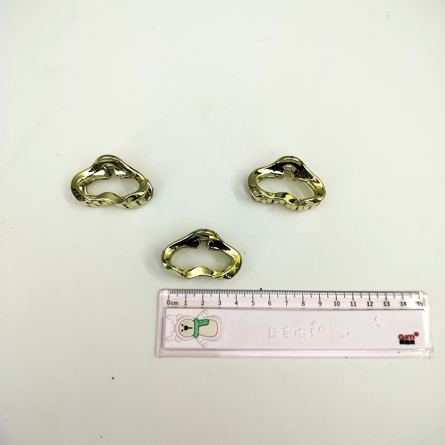 MINI GOLDEN PLASTIC CLAWS (pack of 12)