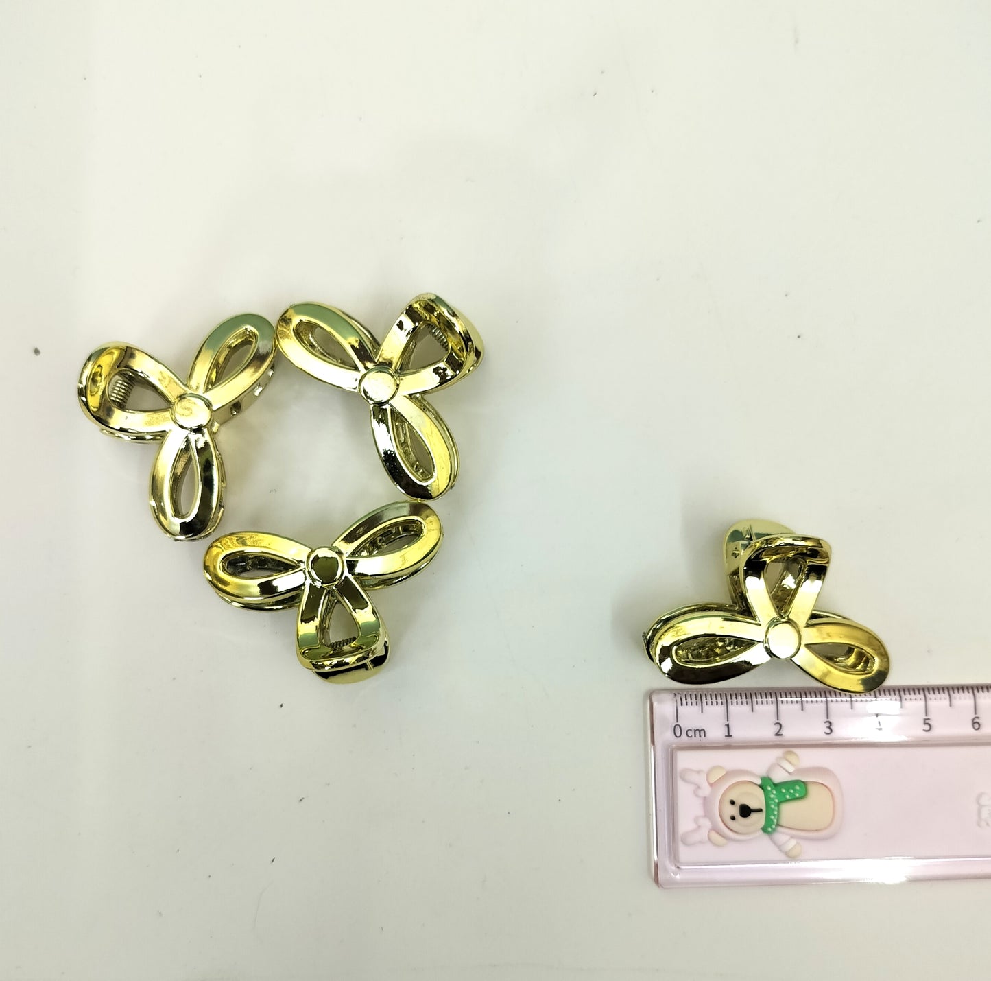 MINI GOLDEN PLASTIC CLAWS (pack of 12)